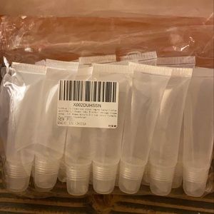 Empty lipgloss tubes